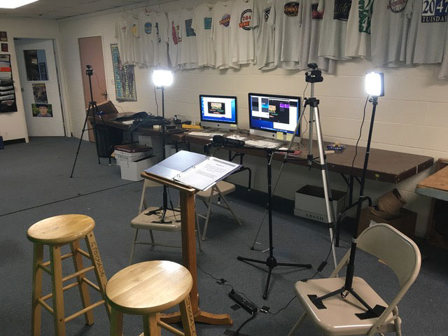 The tech studio – computers, cameras, and (important) lighting.